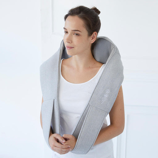 Woman using the JohnsonWellness Quzy Neck Massager on her neck