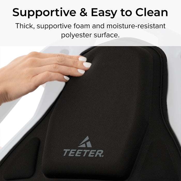 FitSpine Heat and Vibration Comfort Cushion by Teeter close up view of head padding, black inversion table cushion, with text "Supportive and Easy to clean - Thick, supportive foam and moisture-resistant polyester surface."