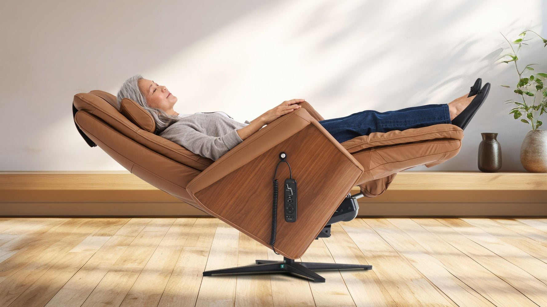 Woman reclining in the Circa Swivel Recliner.